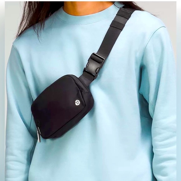 lululemon athletica Handbags - LIKE NEW Lululemon 1L Everywhere Belt Bag Black silver symbol zipper cross body